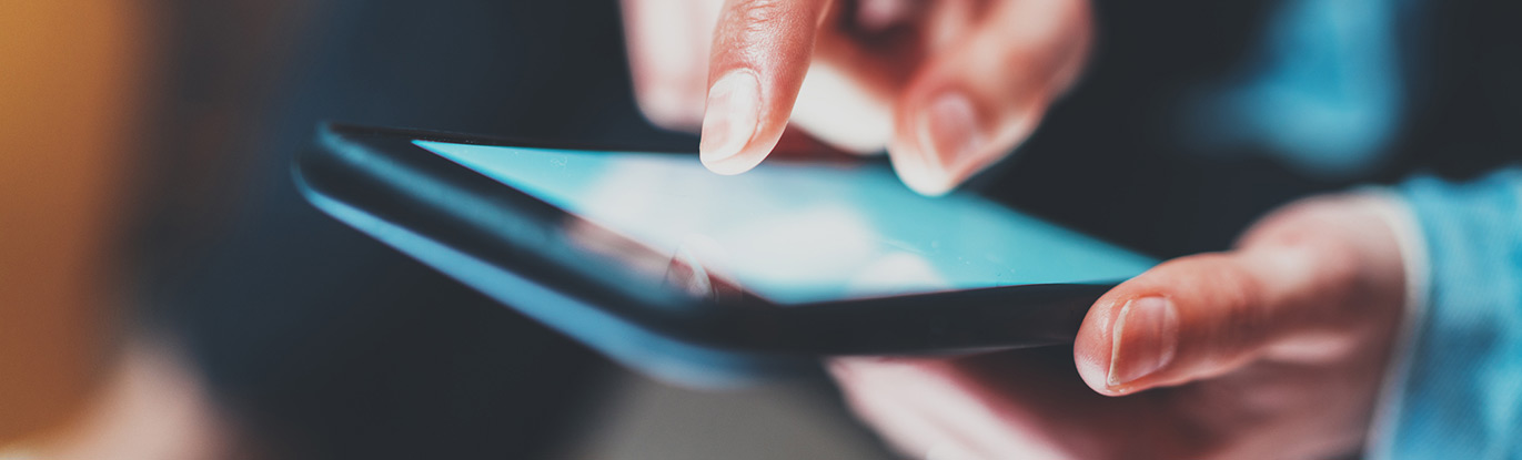 Person paying their loan with their credit union app.